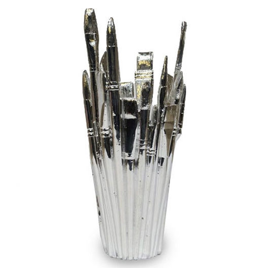 Chrome vase shaped like standing paintbrushes, bristels up