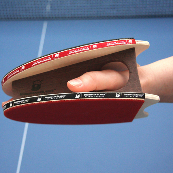 Brodmann_blades_ping_pong_paddle_with_hand-sixhundred