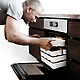 Man putting Stackable Oven-to-Table Cookware by Christian Bjorn into oven