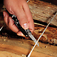 Leatherman 831207 Style CS Clip-On Multi-Tool with Scissors cutting twine off firewood