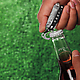 Leatherman 831207 Style CS Clip-On Multi-Tool with Scissors opening a bottle