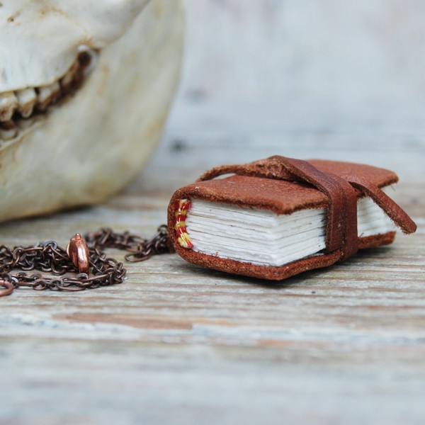 Black_spot_book_necklace_brown_on_side-sixhundred