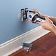 Dremel Trio cutting drywall