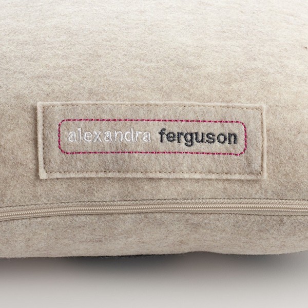 Lets_make_out_pillow_by_alexandra_ferguson_oatmeal_and_red_logo_detail-sixhundred