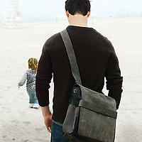 Leather Scout Rubicon Rucksack worn by a father at the beach with young daughter