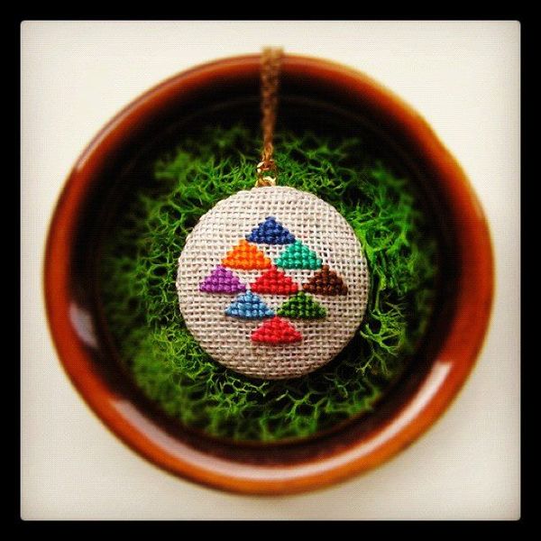 Golden_triangle_cross_stitched_pendant_necklace_by_gamma_folk_2-sixhundred