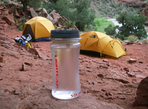 Lightcap_300_solar-powered_lantern_and_water_bottle_daytime_camping-sixhundred