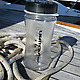 LightCap 300 Solar-Powered Lantern and Water Bottle on a boat