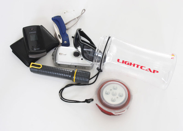 Lightcap_300_solar-powered_lantern_and_water_bottle_with_camera_and_mobile_phone-sixhundred