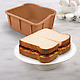 Cakewich Baking Pan with peanut butter and jelly sandwich cake on server
