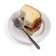 Half eaten peanut butter and jelly sandwich cake with fork and plate