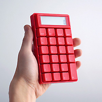 10 Key Calculator red in hand