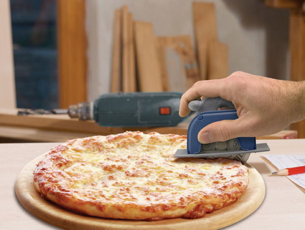 Fred Pizza Boss 3000 cutting through pizza
