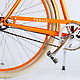 Public Orange D3 Bicycle wheel with kickstand