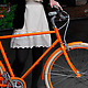 Public Orange D3 Bicycle with girl