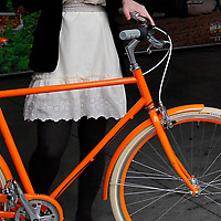 Public Orange D3 Bicycle with girl