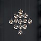Whirly Hanging Candleholder Gift Set close-up on black wall