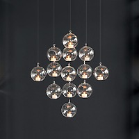 Whirly Hanging Candleholder Gift Set close-up on black wall